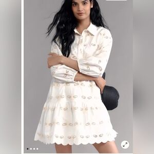The Bettina Eyelet Tiered Mini Shirt Dress NWT. NEVER BEEN WORN.